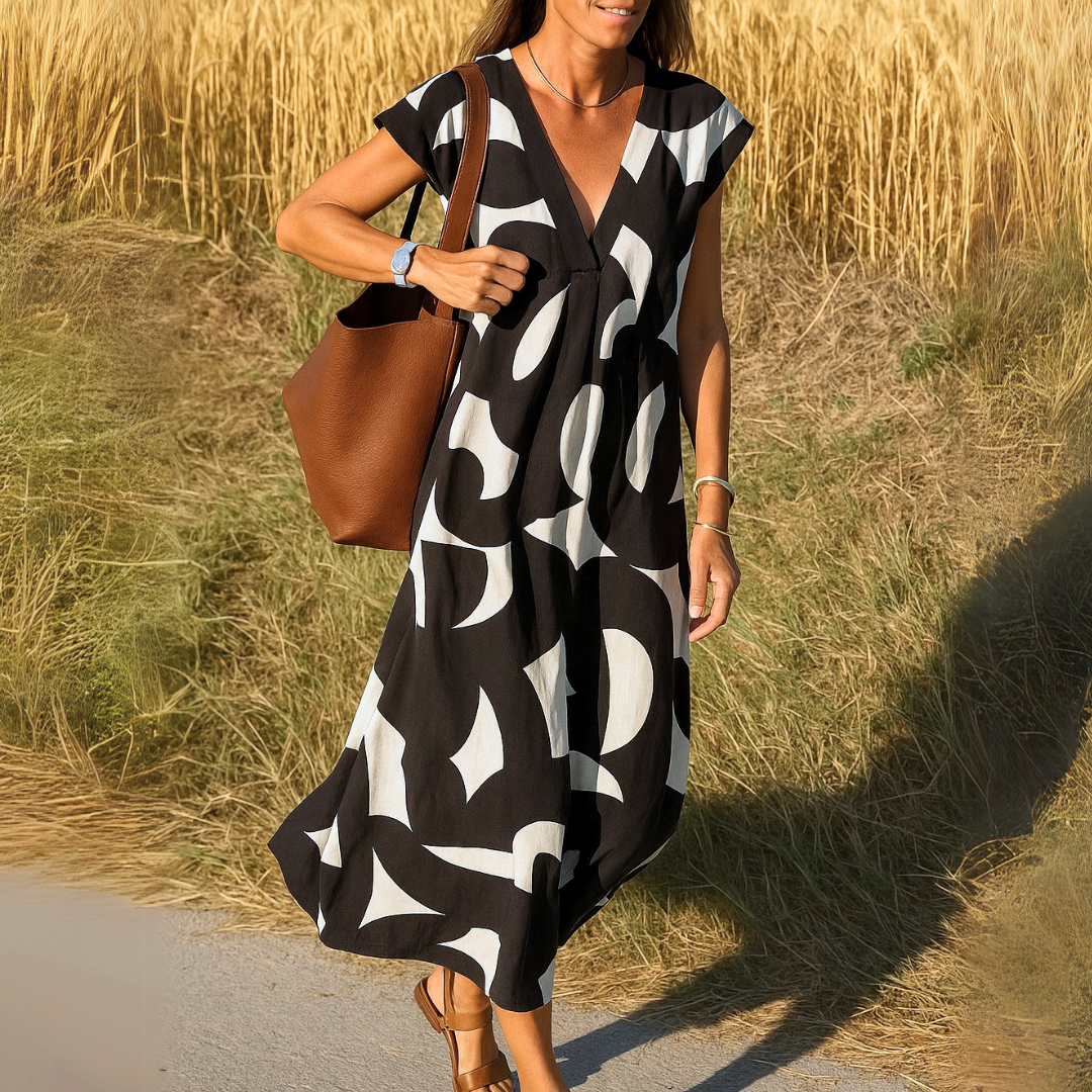 Tirzah - Flowing V-Neck Geometric Print Dress