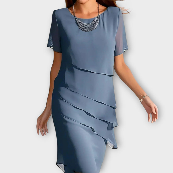 Ione - Ruffle Detail Irregular Hem Tummy Cover Dress